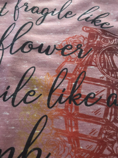 Not fragile like a flower Fragile like a bomb Bella Racerback Tank