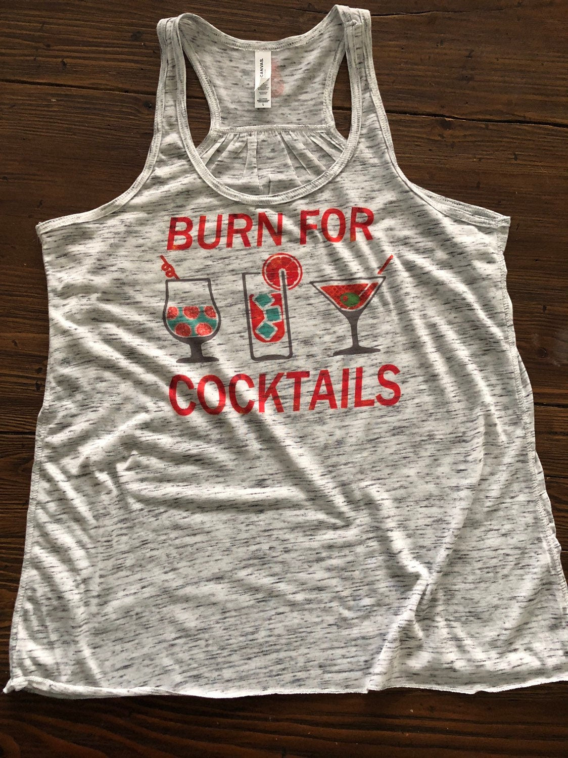 Burn for cocktails Bella Ladies Flowy Racerback Tank