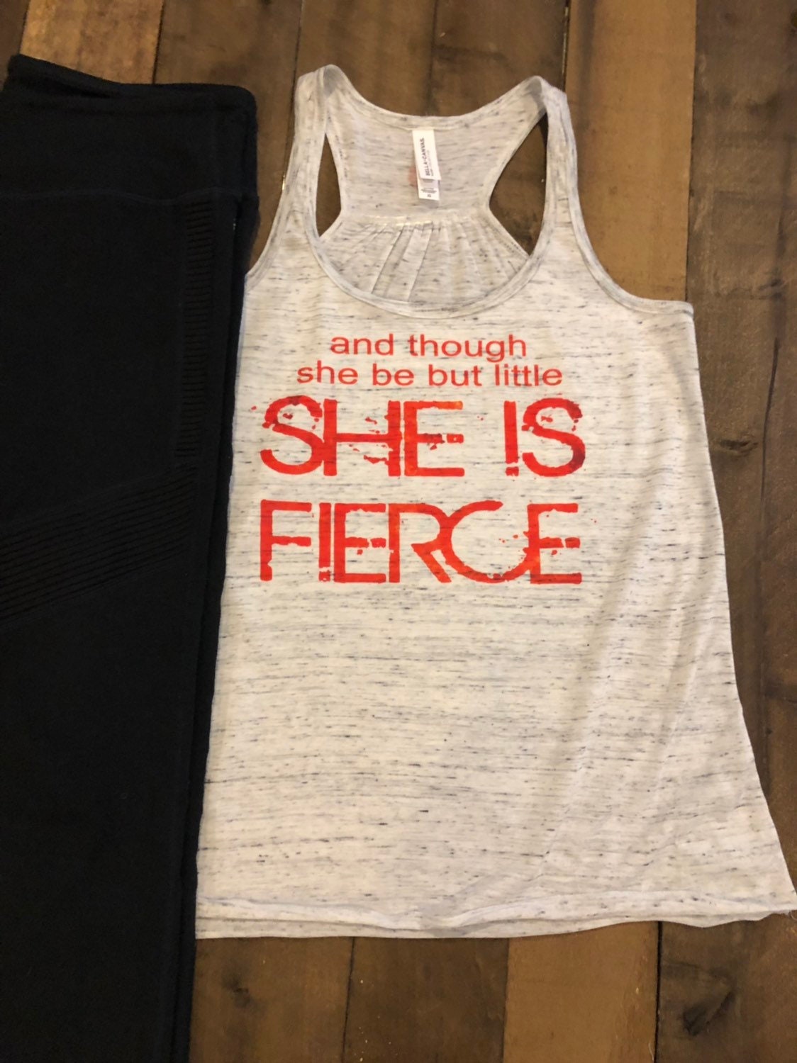 And Though She Be But Little, She Is Fierce Bella Ladies Flowy Racerback Tank