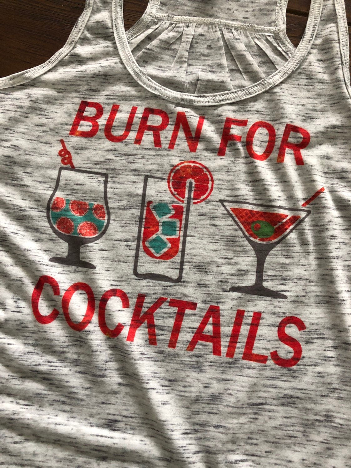 Burn for cocktails Bella Ladies Flowy Racerback Tank