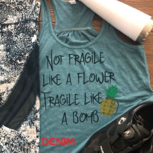 Not fragile like a flower Fragile like a Bomb/Bella Ladies Flowy Racerback Tank