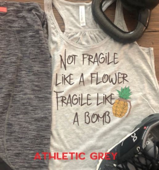 Not fragile like a flower Fragile like a Bomb/Bella Ladies Flowy Racerback Tank